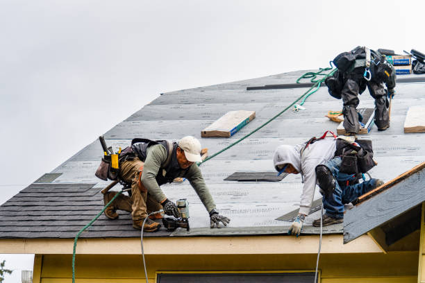 Professional Roofing technician working in Midland, PA